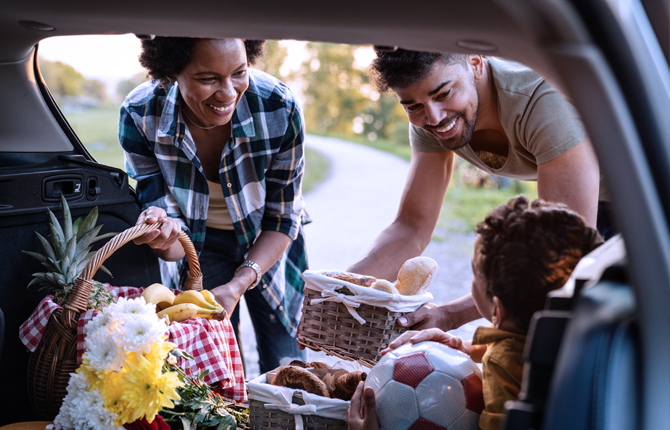 Family getting ready to picnic  - Agero Extended Benefits