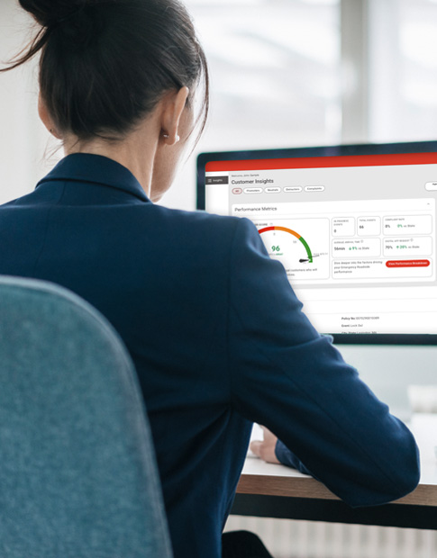 Agero - women insurance agent using RoadsideAID dashboard