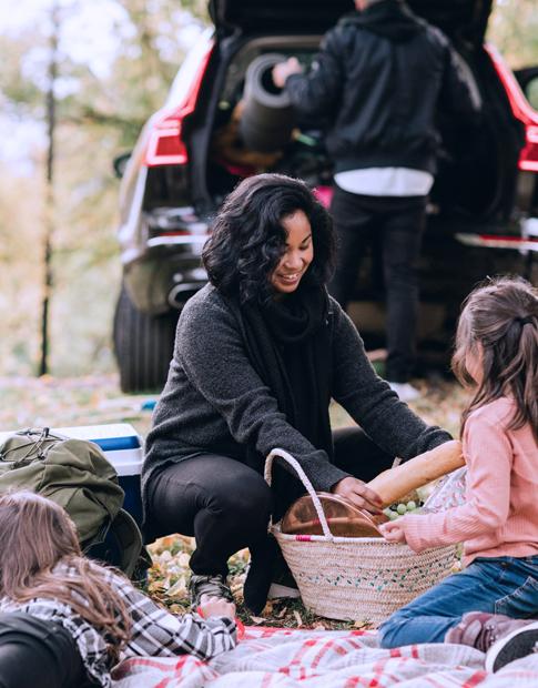 Family - picnicing during fall/winter season - Agero, Inc.