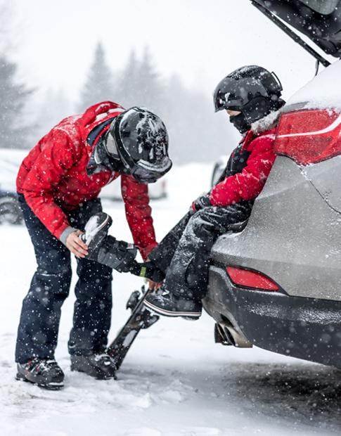 Winter - Ski Boots Back of Vehicle in the Snow